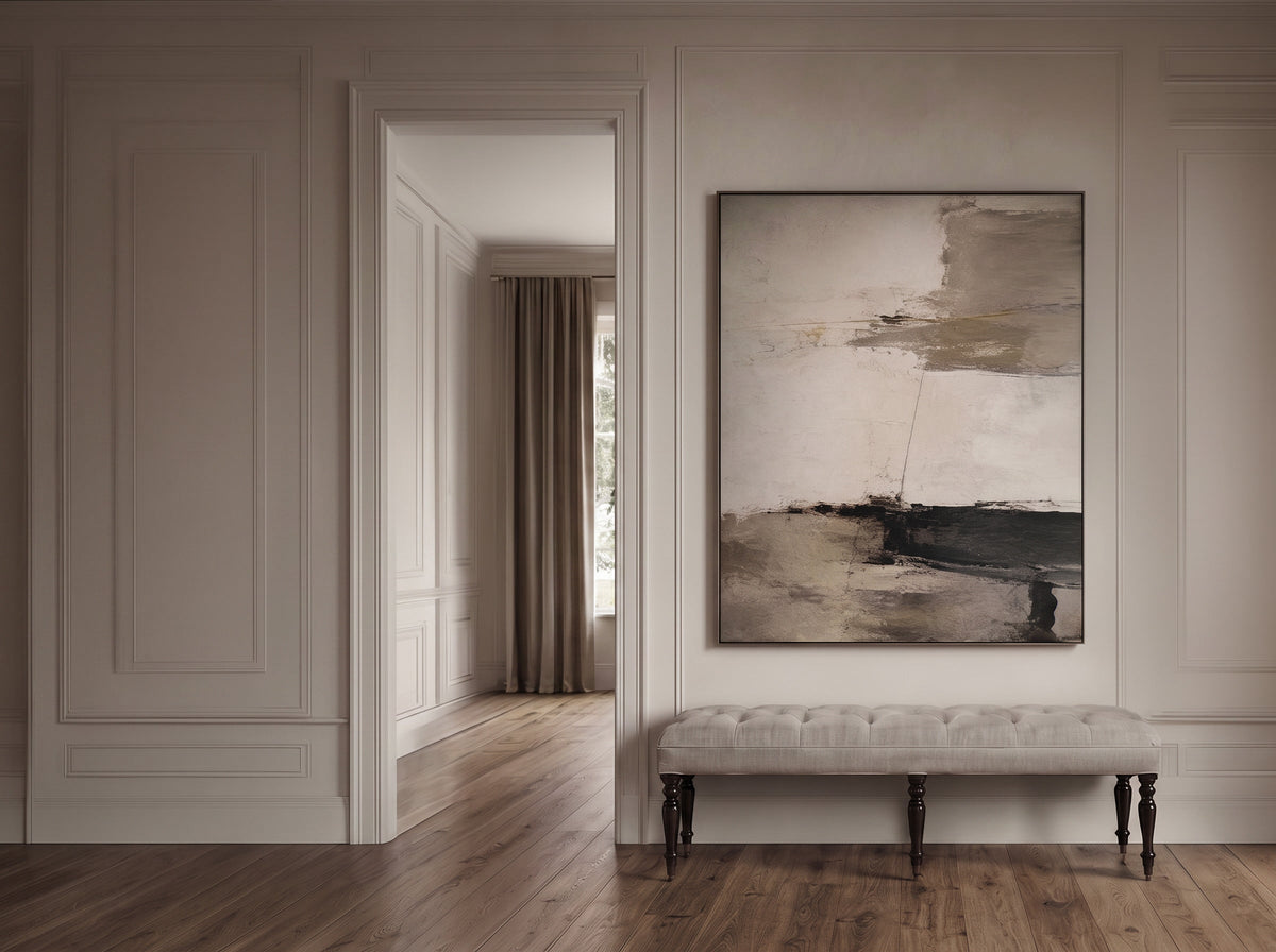 Bramley House entry hall: a tufted upholstered bench on turned legs beneath a large abstract canvas, on panelled walls with wide-plank oak floors and an open doorway to a curtained window.