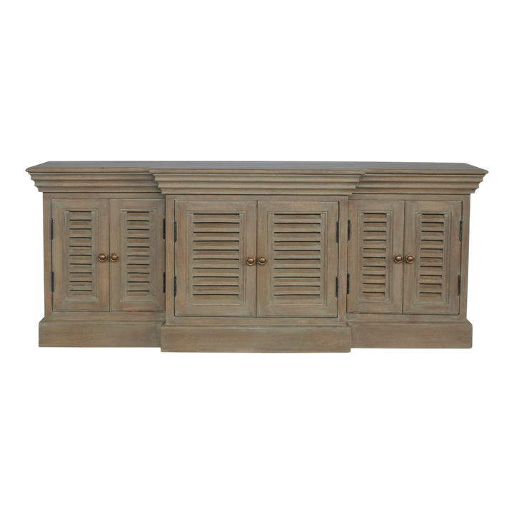 Aldeburgh TV Console in Driftwood, front view. Driftwood finish with six louvred shutter doors.