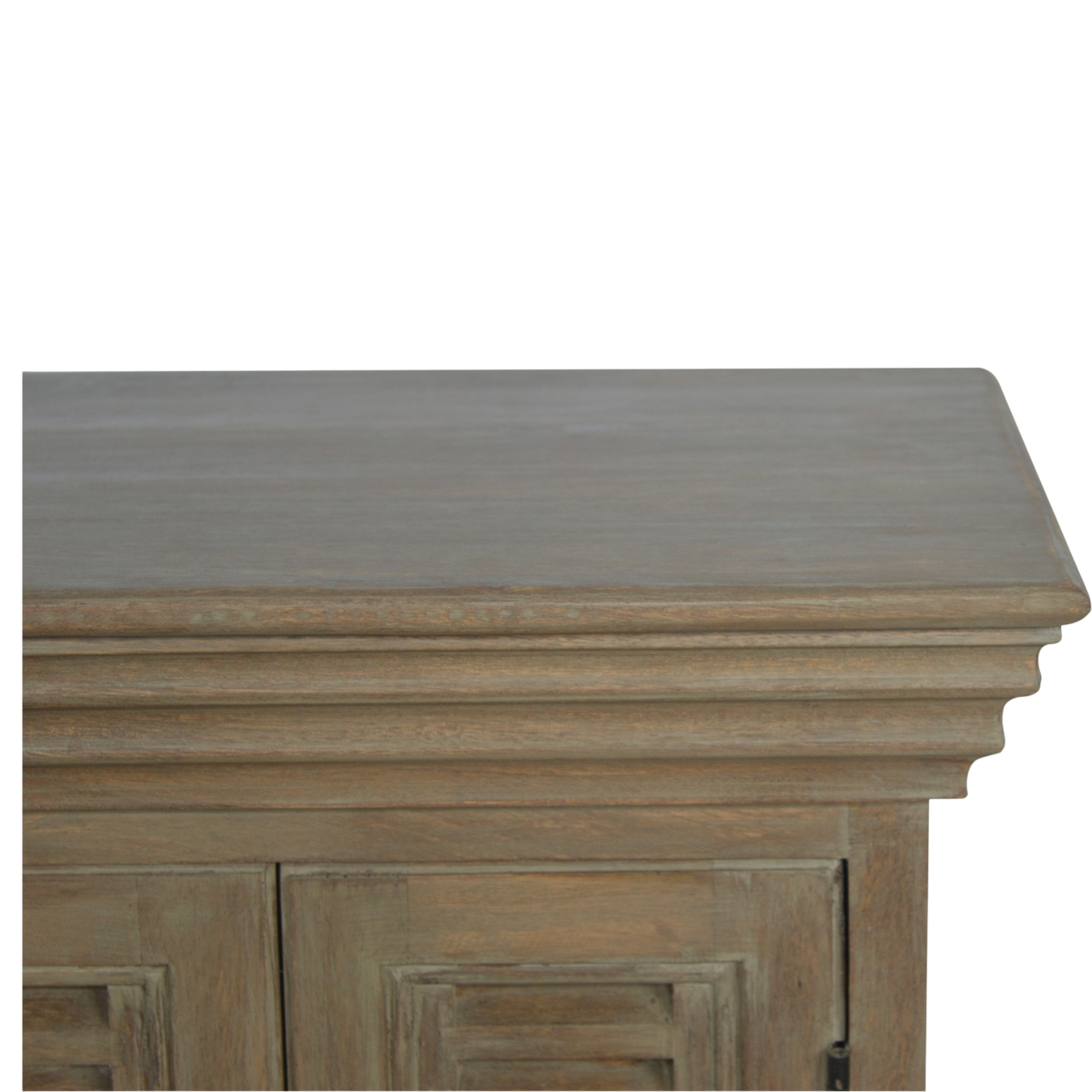 Close view of the cornice and top edge on the Aldeburgh TV Console in Driftwood.