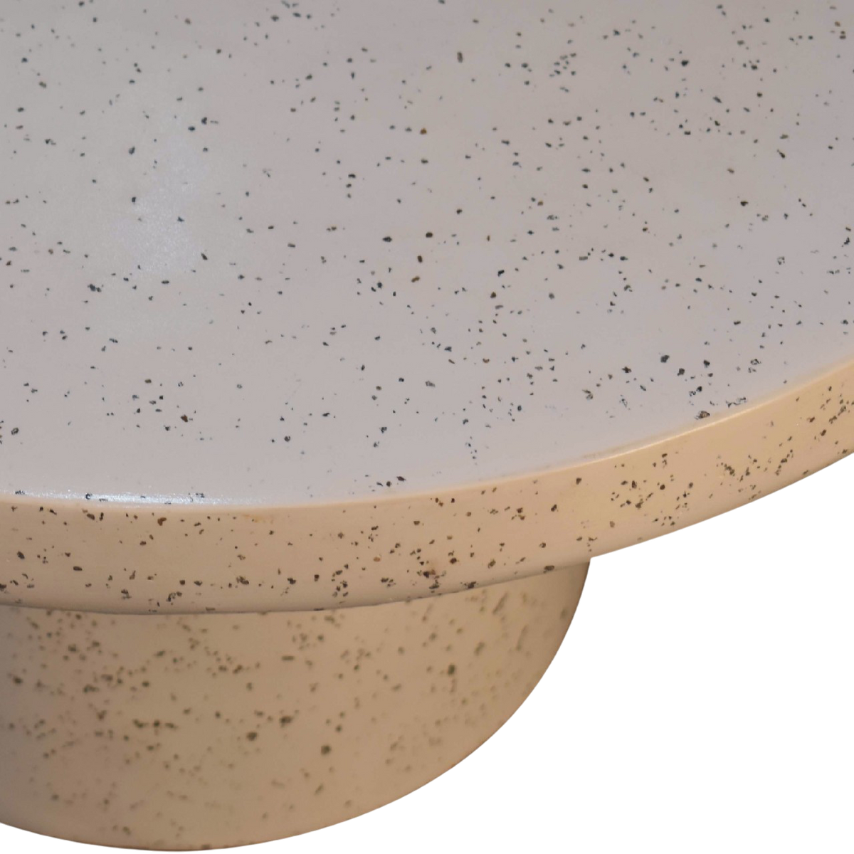 Close view of the edge profile and speckled surface on the Amalfi Terrazzo Cocktail Table.
