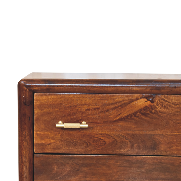 Close view of the brass hardware on the Ashcombe 2-Drawer Bedside Table with Woven Shelf in Chestnut.