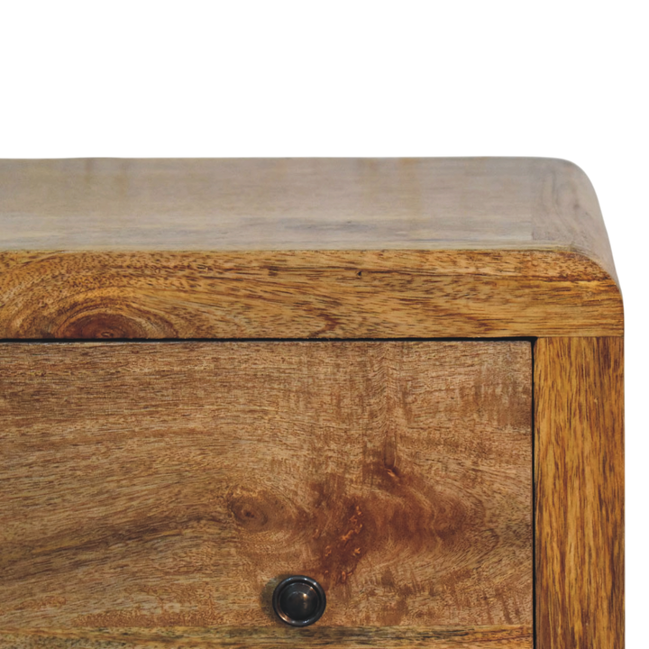 Close view of the brass hardware on the Ashcombe 3-Drawer Chest in Amber.