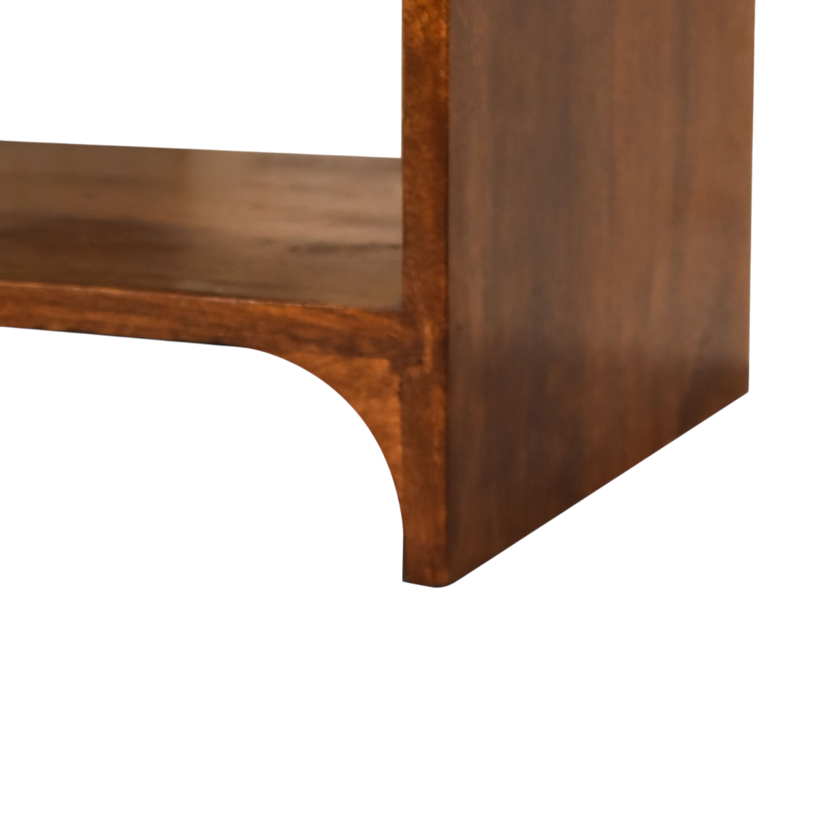 Close view of the shelf on the Ashford Open Bedside Table in Chestnut.