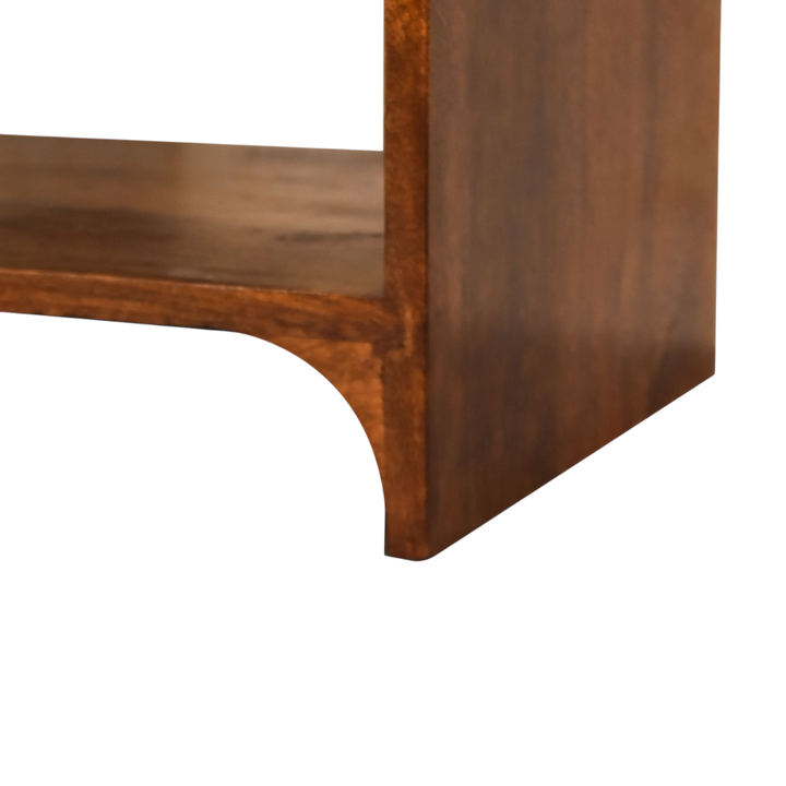 Close view of the shelf on the Ashford Open Bedside Table in Chestnut.
