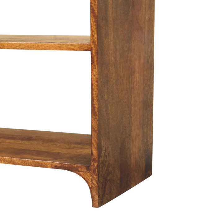 Close view of the shelf on the Ashford Open Console Table in Chestnut.