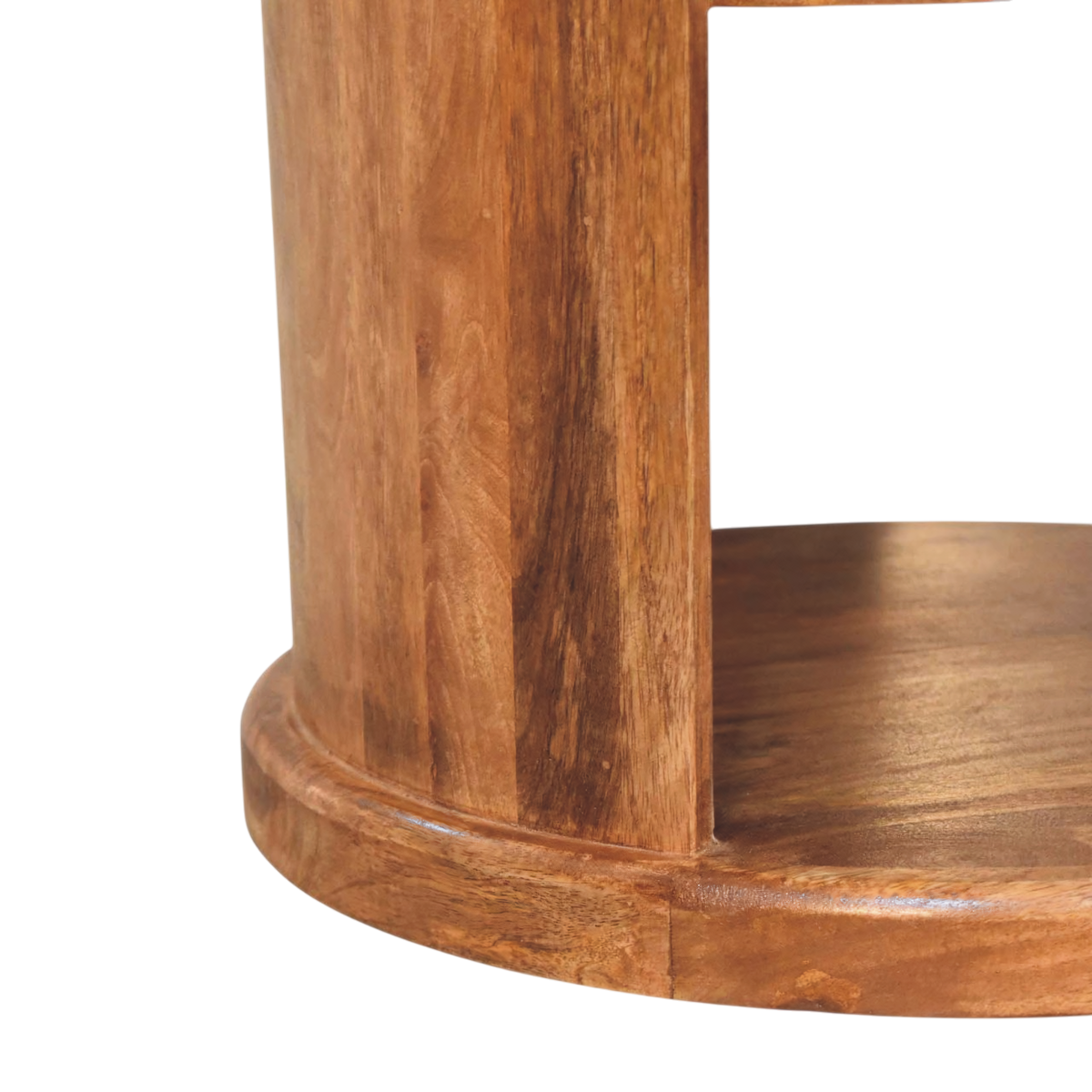 Close view of the shelf on the Ashford Open Round Side Table in Amber.