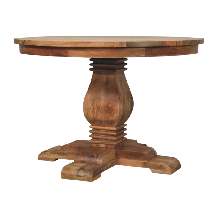 Ashford Round Pedestal Table in Amber, front view. A round solid wood top on a sculpted pedestal base.