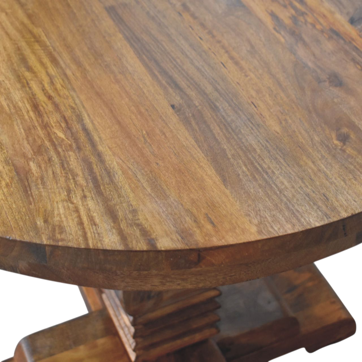 Close view of the grain on the tabletop on the Ashford Round Pedestal Table in Chestnut.