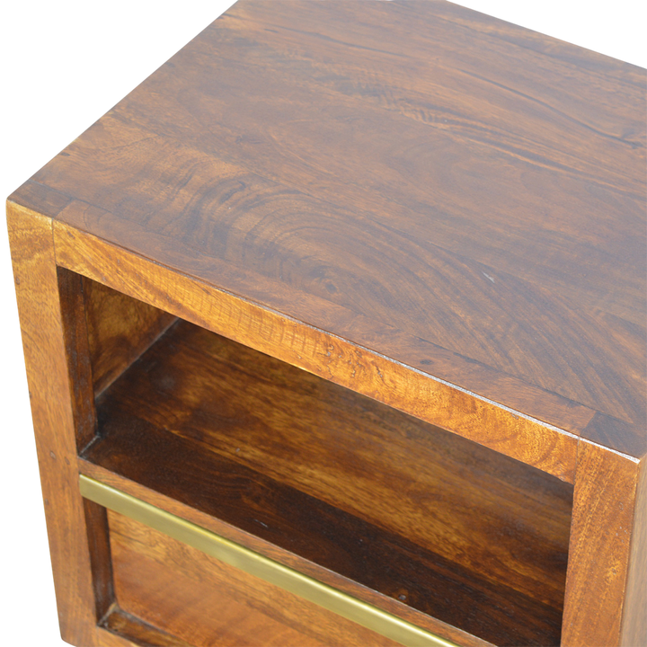 Close view of the shelf on the Belgrave Bedside Table in Chestnut.