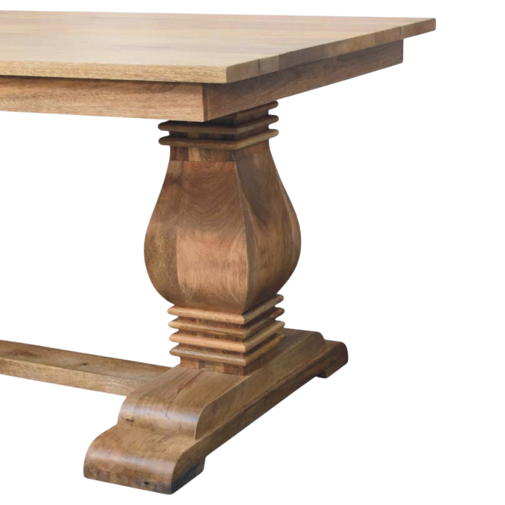 Close view of the pedestal base on the Belvedere Dining Table in Amber.