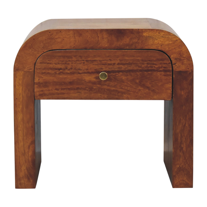 Bibury Bedside Table in Chestnut, front view. Solid hardwood in a chestnut finish, one drawer on a brass knob, curved edges.