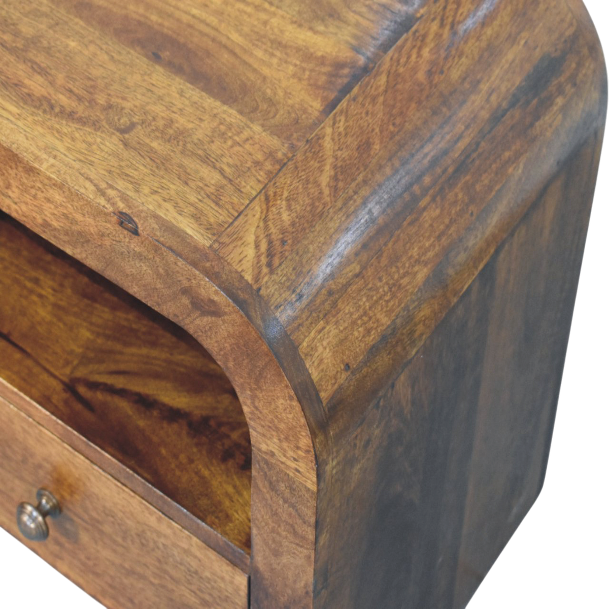 Close view of the edge on the Bibury Open Bedside Table in Chestnut.