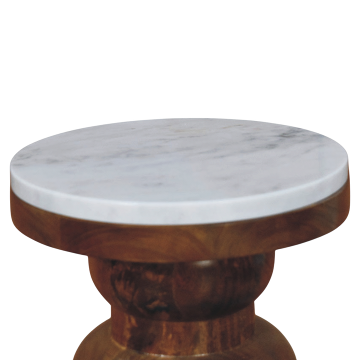 Close view of the top on the Bramante Marble Side Table in Russet.