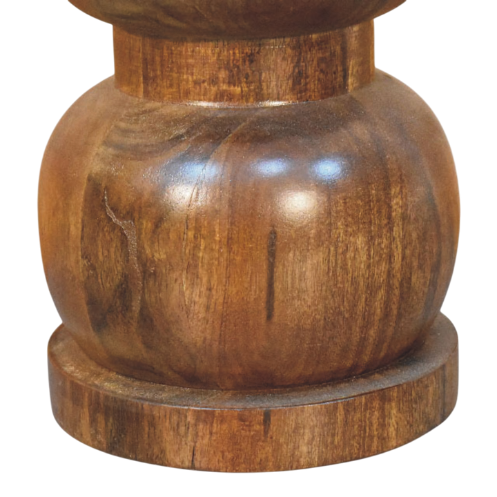 Close view of the base on the Bramante Marble Side Table in Russet.