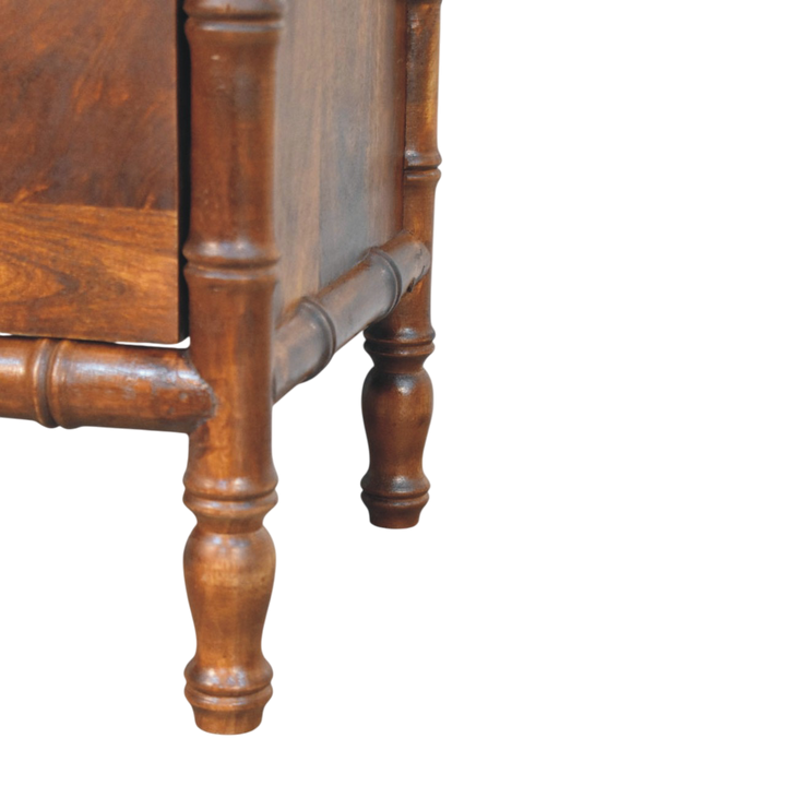 Close view of the turned legs on the Brighton 2-Drawer Bedside Table in Russet.