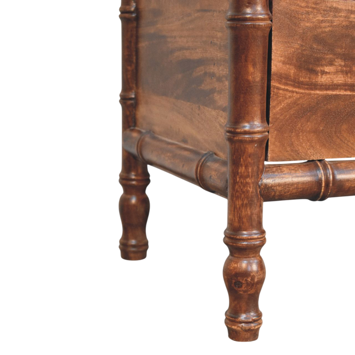 Close view of the turned legs on the Brighton 2-Drawer Nightstand in Chestnut.