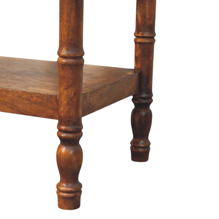 Close view of the turned legs on the Brighton Open Nightstand in Russet.