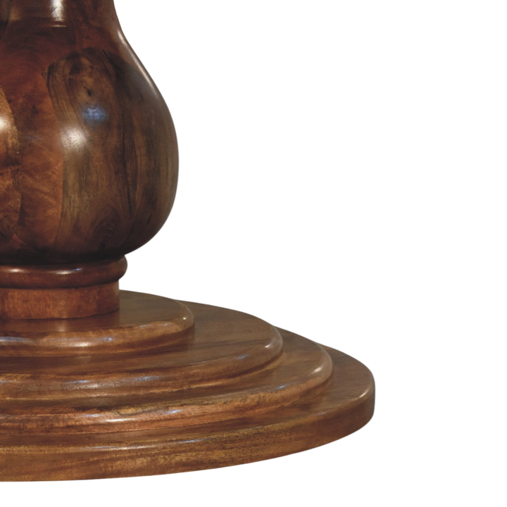 Close view of the pedestal base on the Cavendish Round Dining Table in Chestnut.