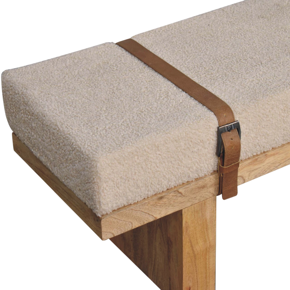 Close view of the strap and buckle on the Chamonix Buckled Bench in Cream Bouclé with Tobacco Leather.