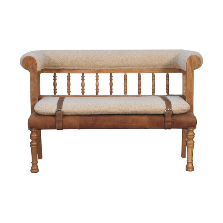 Chamonix Carved Hall Bench in Cream Bouclé with Tobacco Leather, front view. Cream bouclé in cotton and natural yarn on seat and back, tobacco leather buckle straps.
