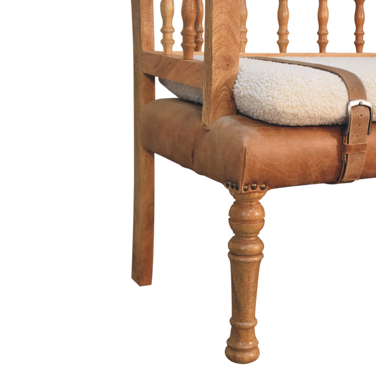 Close view of the legs on the Chamonix Carved Hall Bench in Cream Bouclé with Tobacco Leather.