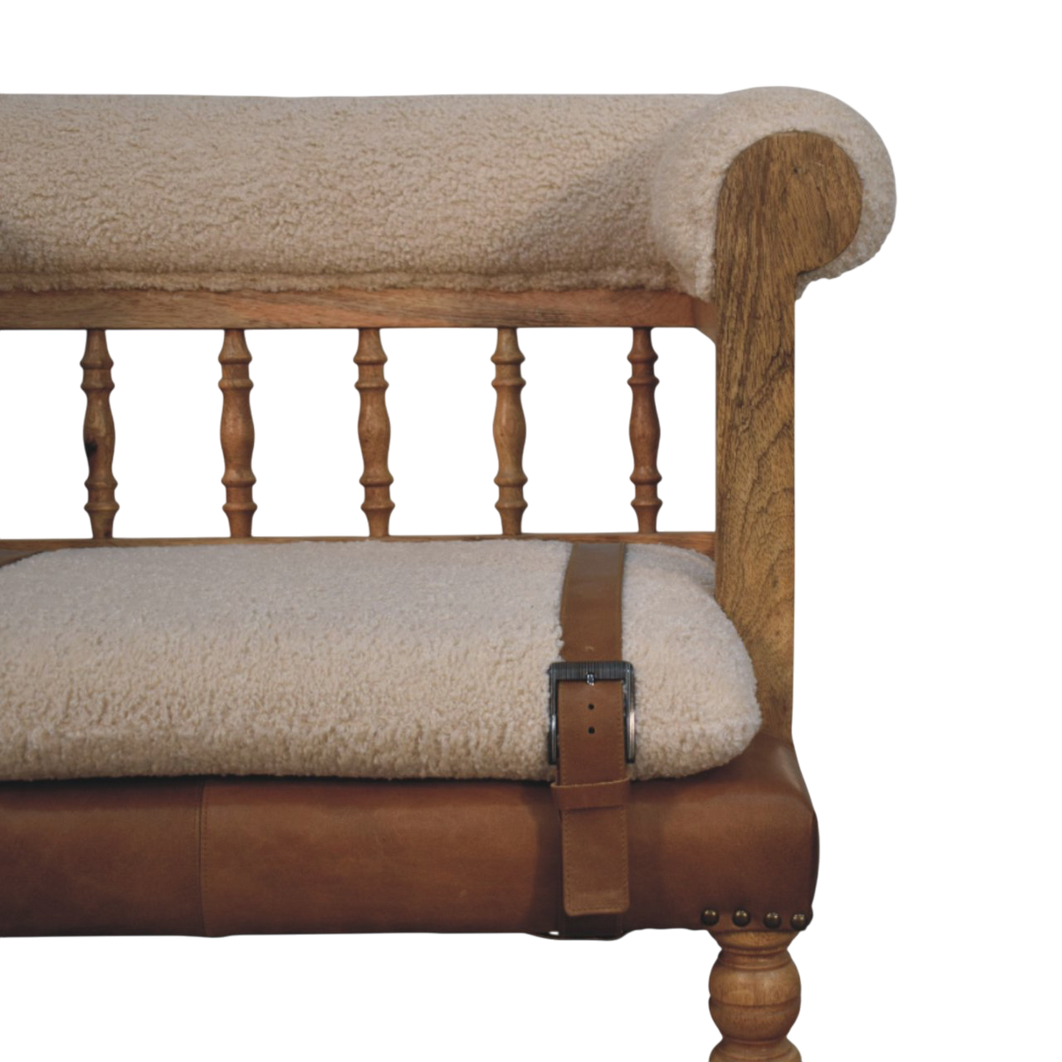 Close view of the seat on the Chamonix Spindle-Back Bench in Cream Bouclé with Tobacco Leather.