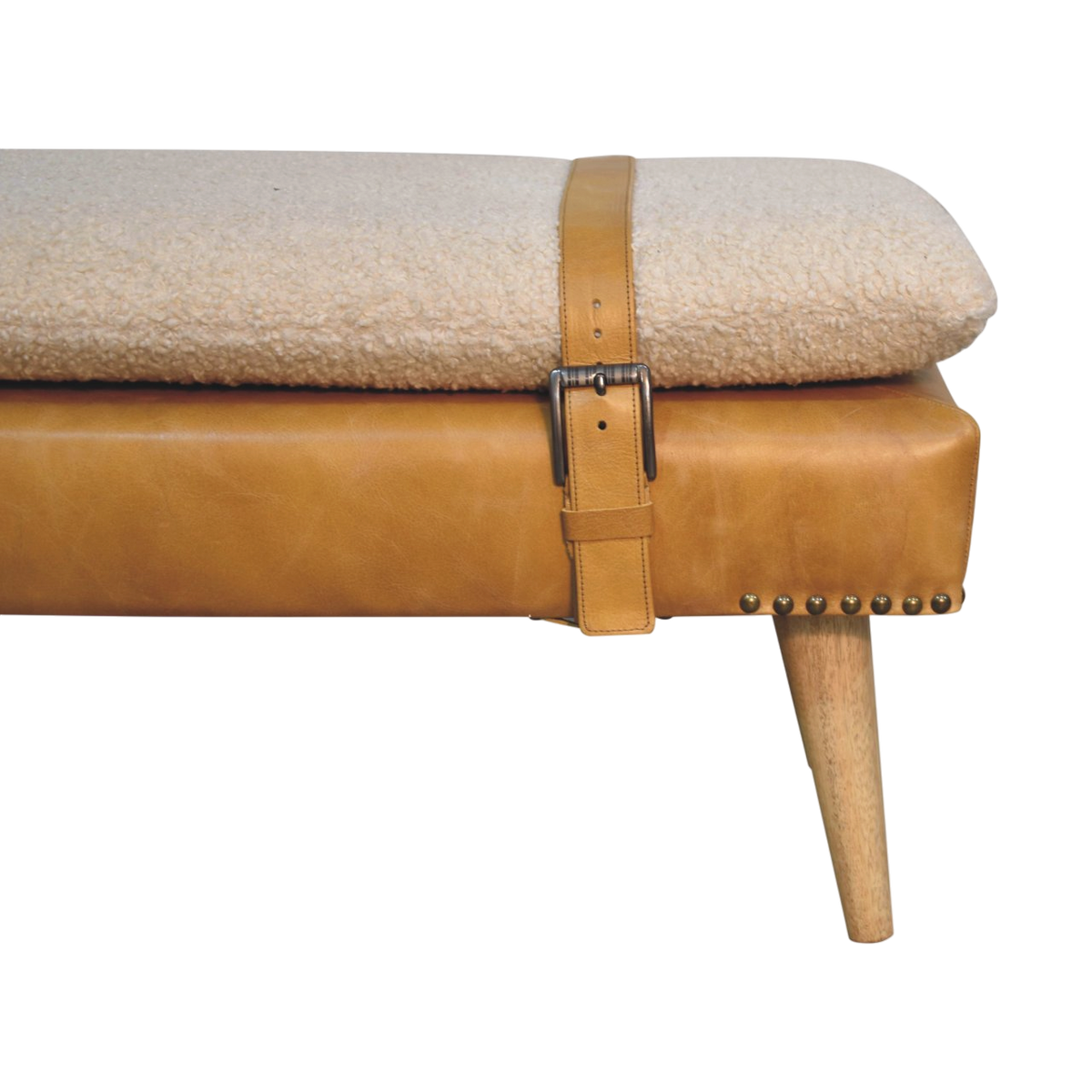 Close view of the strap and buckle on the Chamonix Strap Bench in Cream Bouclé with Blonde Saddle.