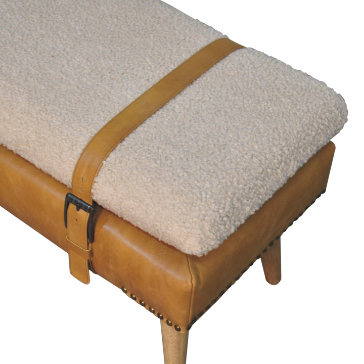 Close view of the bouclé on the Chamonix Strap Bench in Cream Bouclé with Blonde Saddle.