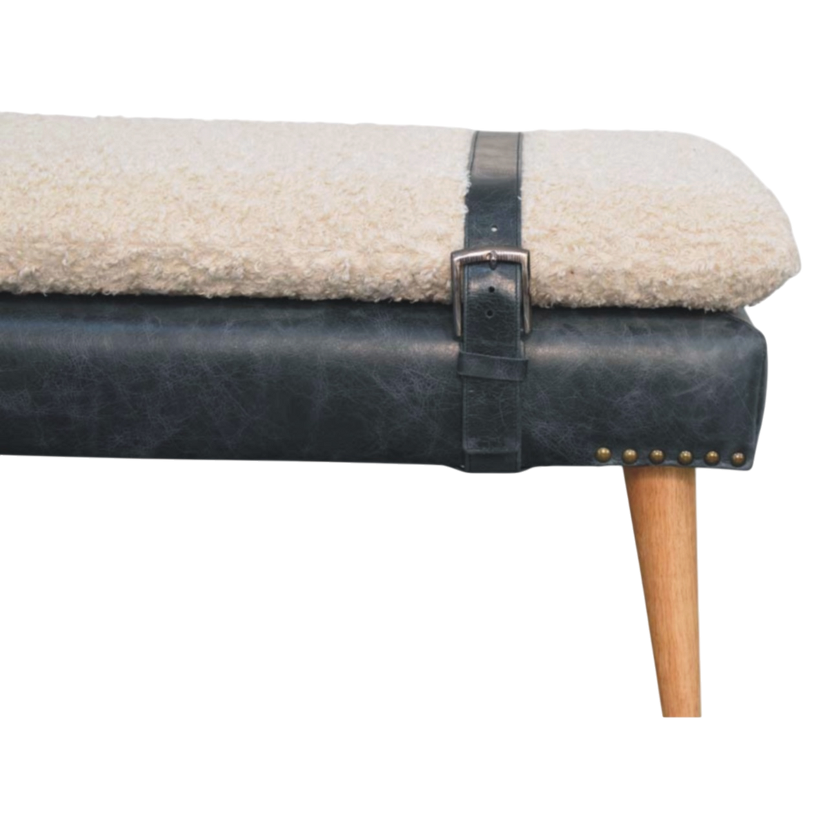 Close view of the strap and buckle on the Chamonix Strap Bench in Cream Bouclé with Charcoal Leather.