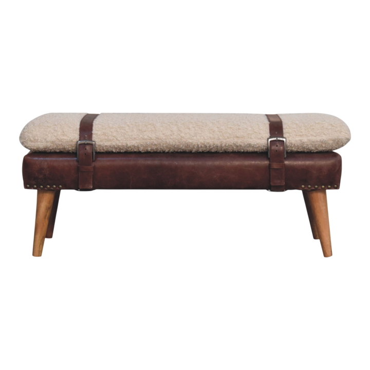 Chamonix Strap Bench in Cream Bouclé with Cognac Leather, front view. Cognac leather base with nailhead trim, loose handwoven bouclé cushion in cotton and natural yarn.