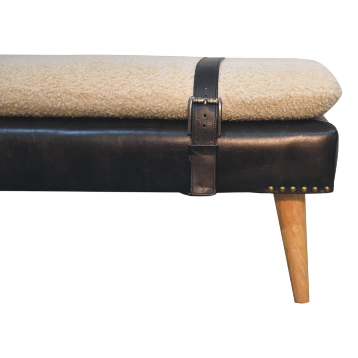 Close view of the strap and buckle on the Chamonix Strap Bench in Cream Bouclé with Espresso Leather.