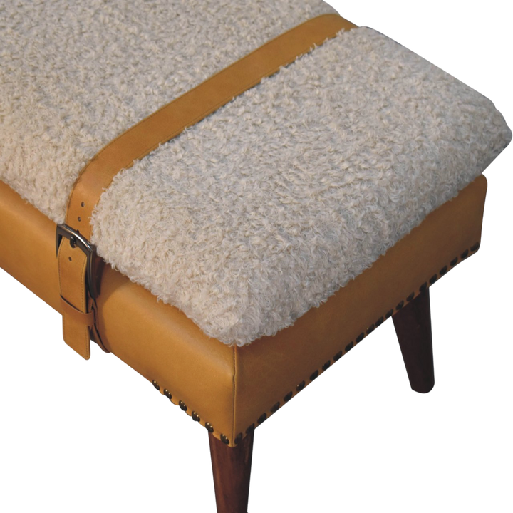 Close view of the bouclé on the Chamonix Strap Bench in Cream Bouclé with Tobacco Leather.