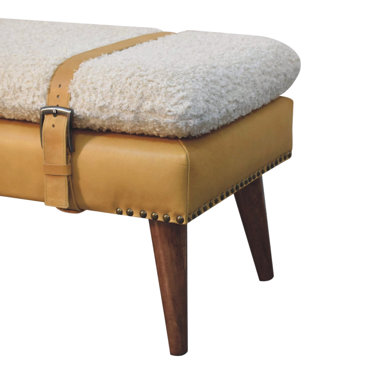 Close view of the turned legs on the Chamonix Strap Bench in Cream Bouclé with Tobacco Leather.