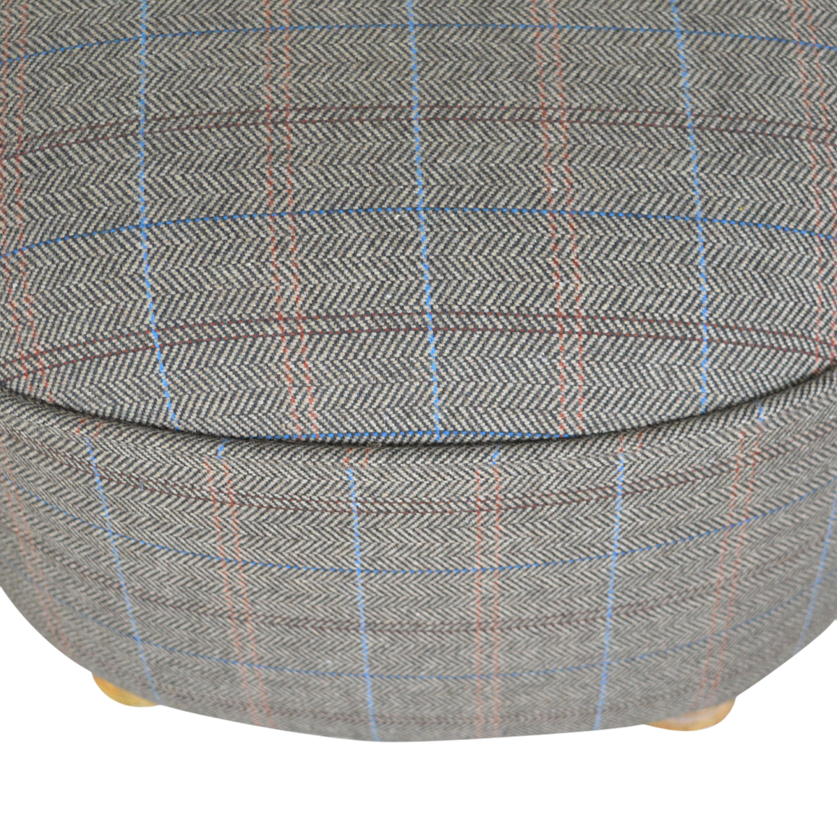 Close view of the seat on the Cheltenham Oval Footstool in Heritage Tweed.