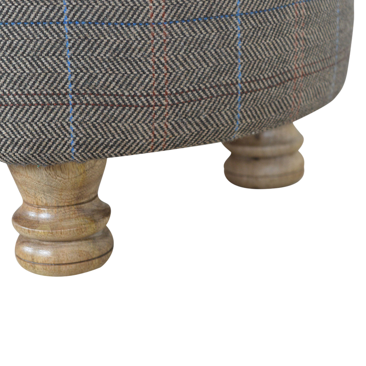 Close view of the feet on the Cheltenham Oval Footstool in Heritage Tweed.