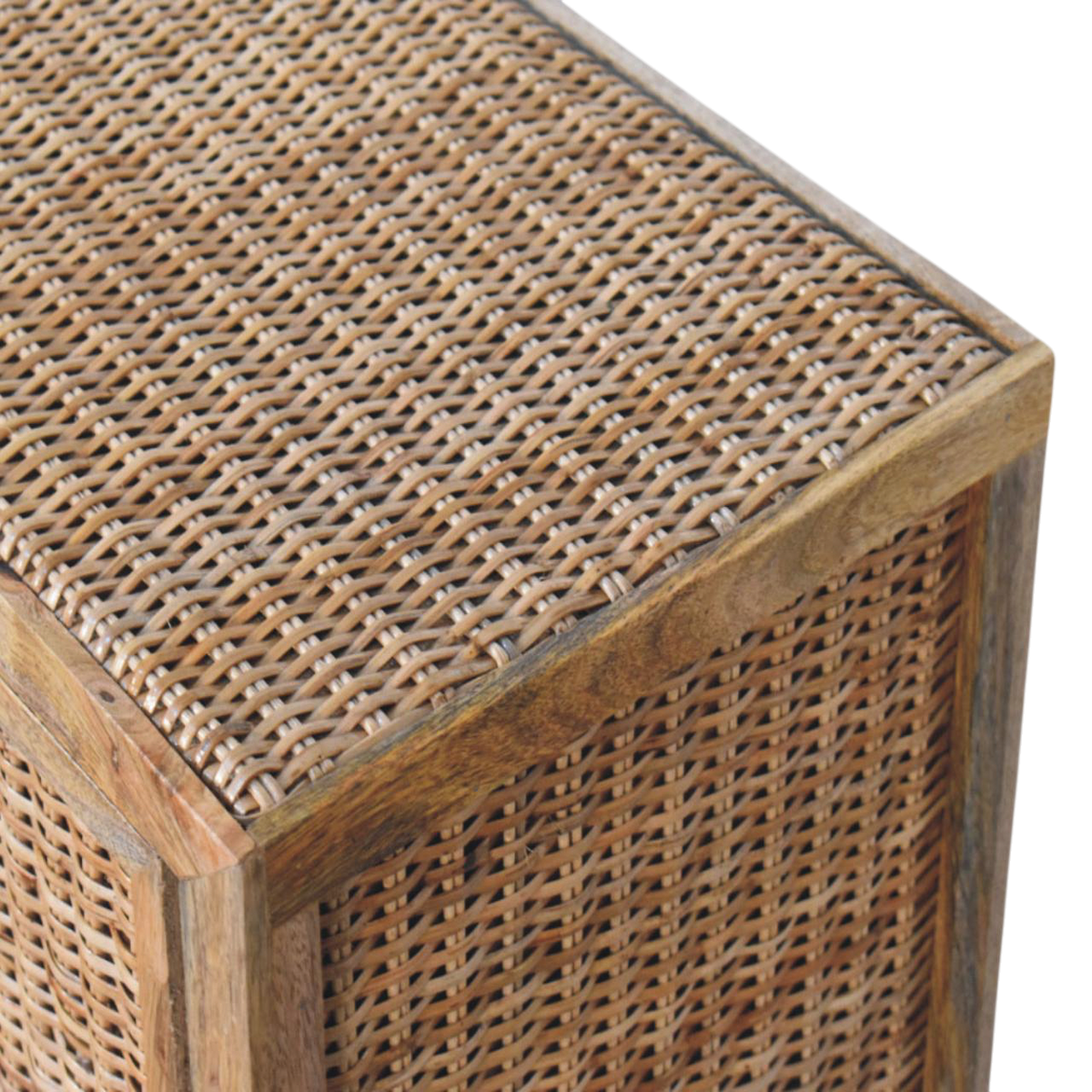 Close view of the weave on the Comporta 2-Door Cabinet in Amber with Natural Rattan.