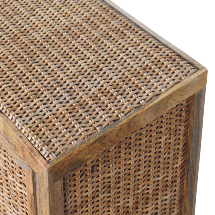 Close view of the weave on the Comporta 2-Door Cabinet in Amber with Natural Rattan.