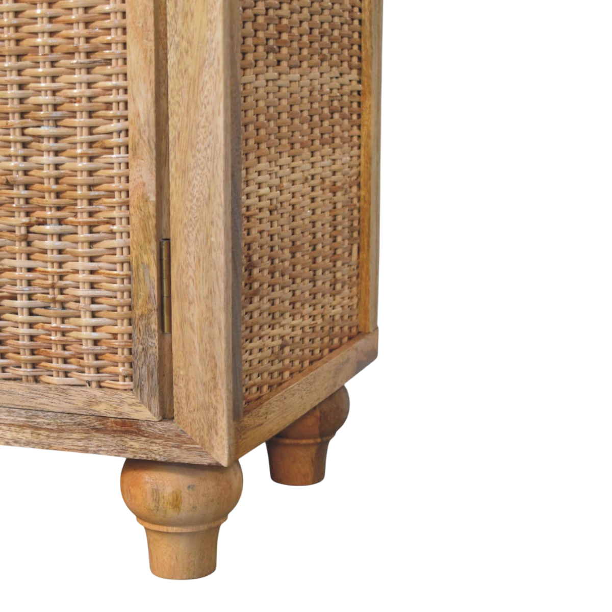 Close view of the feet on the Comporta 2-Door Cabinet in Amber with Natural Rattan.