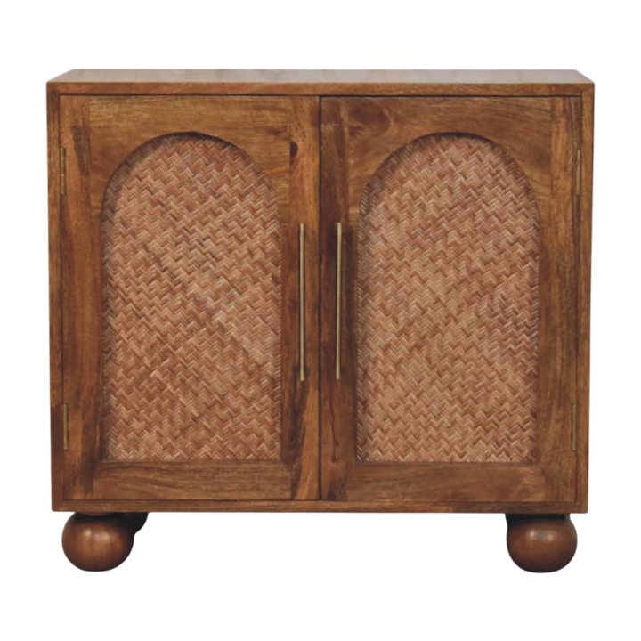 Comporta Arched Cane Sideboard in Amber with Natural Rattan, front view. Solid hardwood in an amber finish, arched door panels hand-woven in a herringbone pattern.