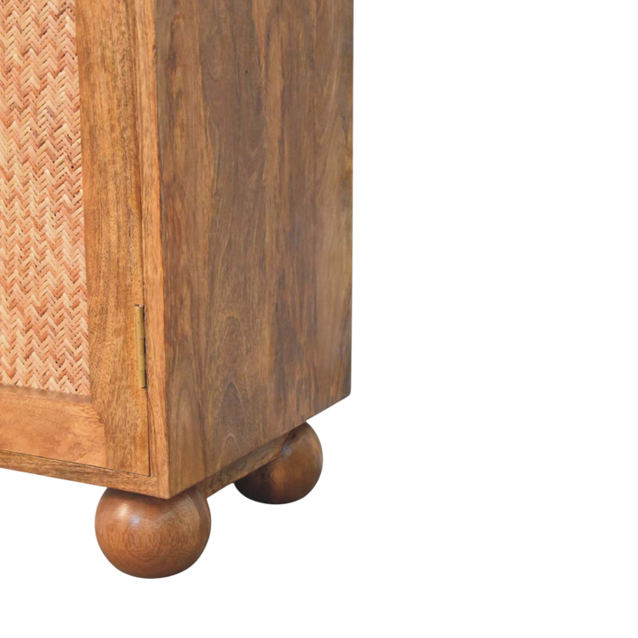 Close view of the woven panels on the Comporta Arched Cane Sideboard in Amber with Natural Rattan.