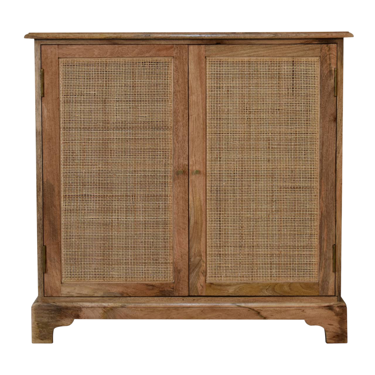Comporta Cane Cabinet in Amber, front view. Amber hardwood with two woven rattan doors and a stable plinth base.