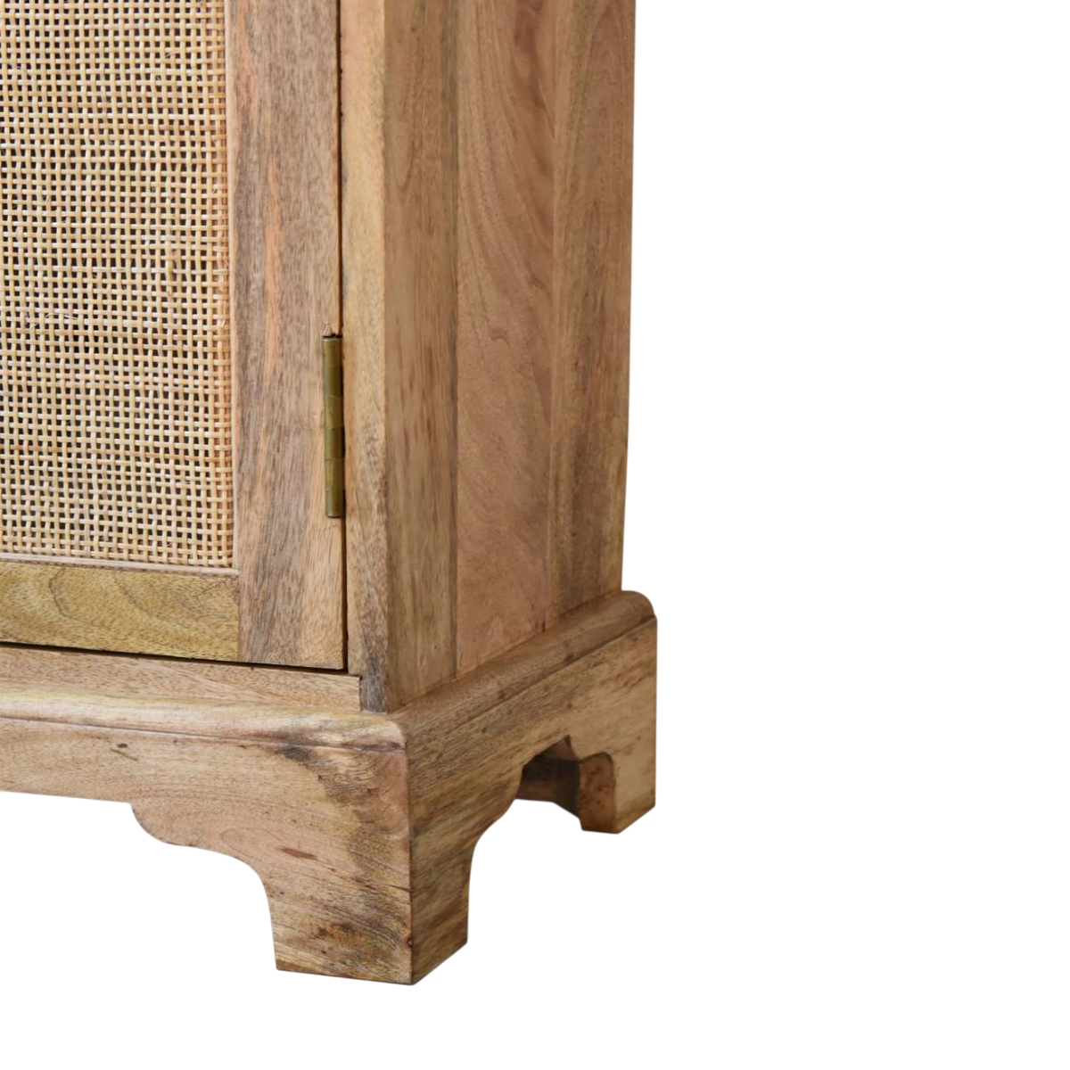 Close view of the turned foot on the Comporta Cane Cabinet in Amber.