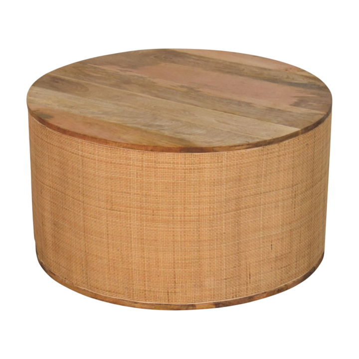 Comporta Drum Coffee Table, three-quarter view showing the full profile.