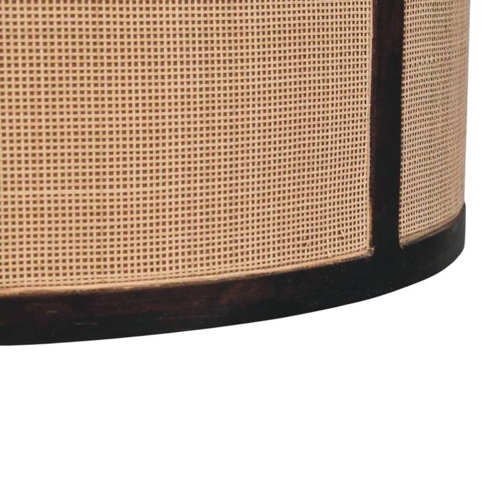 Close view of the rattan wrap on the base on the Comporta Drum Coffee Table in Espresso and Natural Rattan.