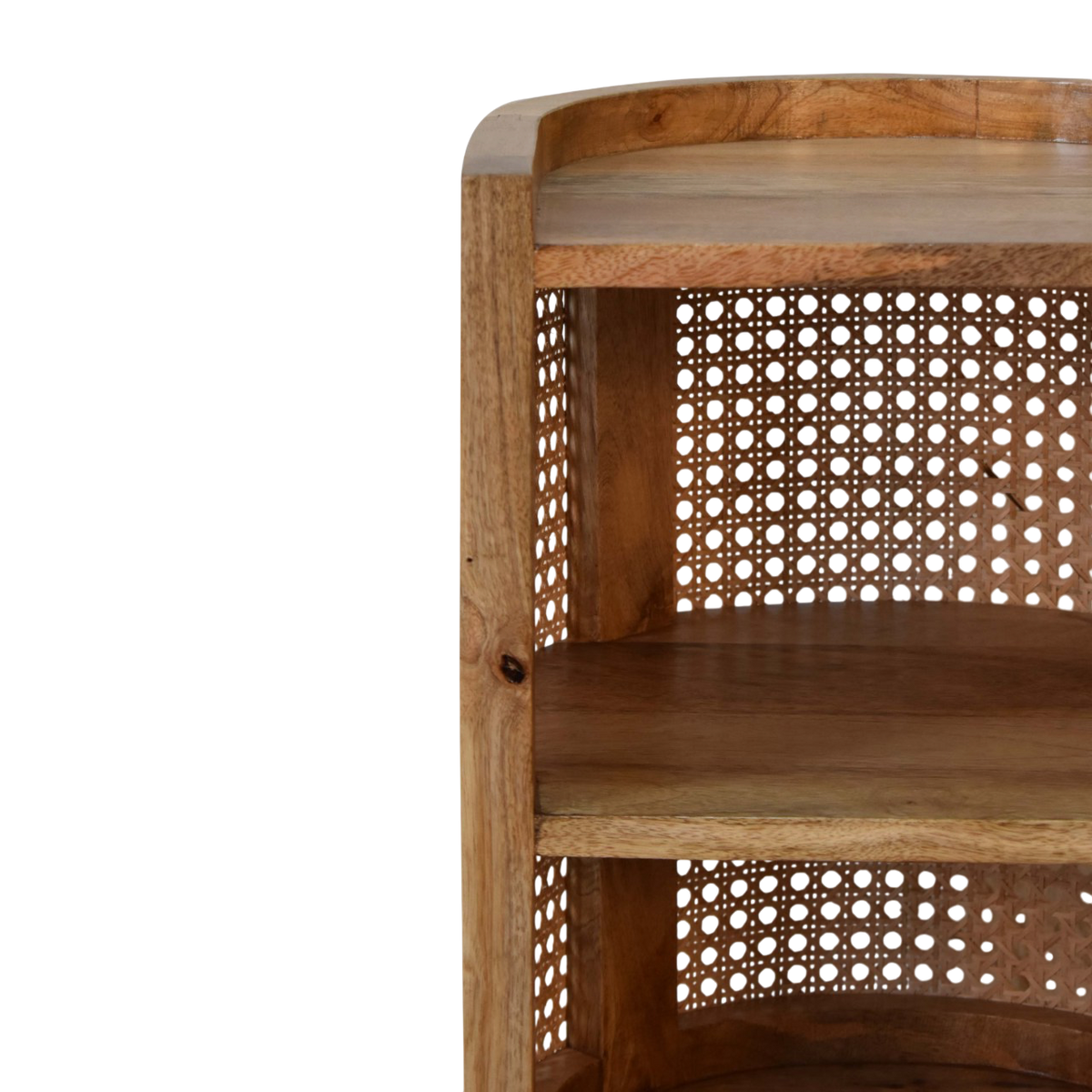 Close view of the shelf on the Comporta Mini Open Bedside Table in Amber with Natural Rattan.