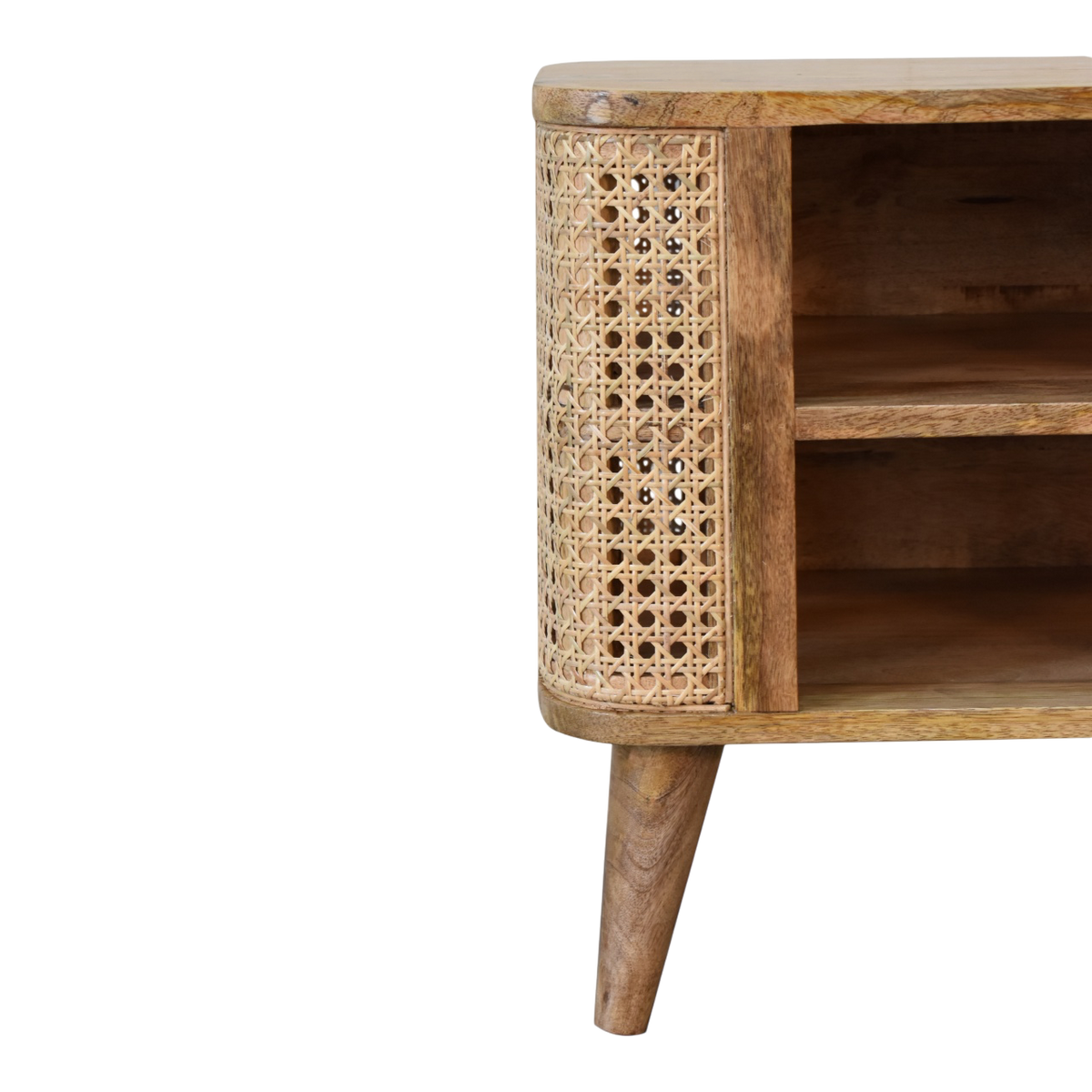 Close view of the shelf on the Comporta Open Bedside Table in Amber with Natural Rattan.