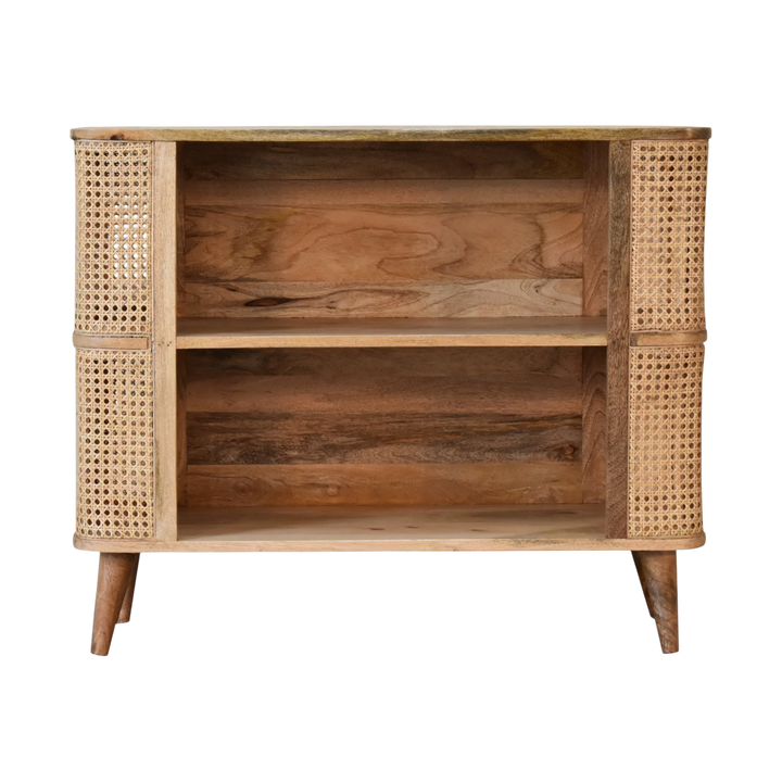 Comporta Open Cabinet in Amber with Natural Rattan, front view. 100% solid hardwood in a warm amber finish, woven rattan side panels, two open shelves, tapered legs.