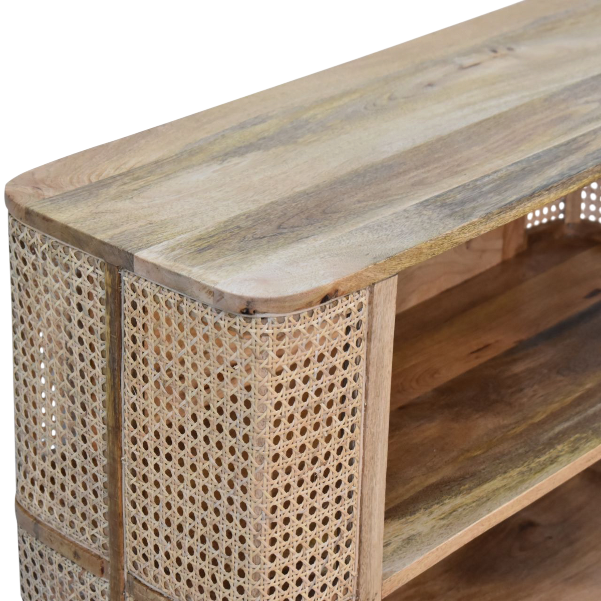Close view of the woven panels on the Comporta Open Cabinet in Amber with Natural Rattan.
