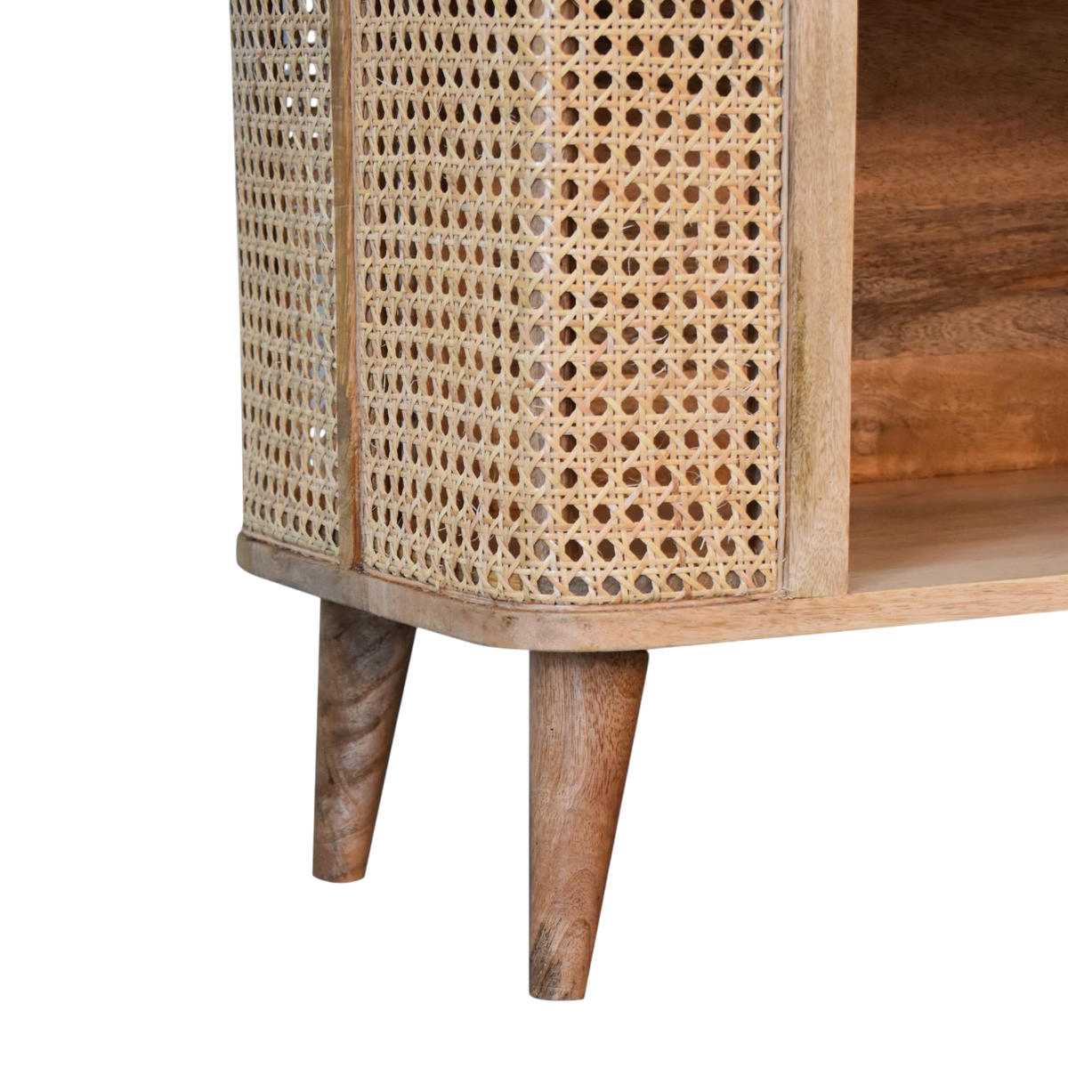 Close view of the legs on the Comporta Open Cabinet in Amber with Natural Rattan.