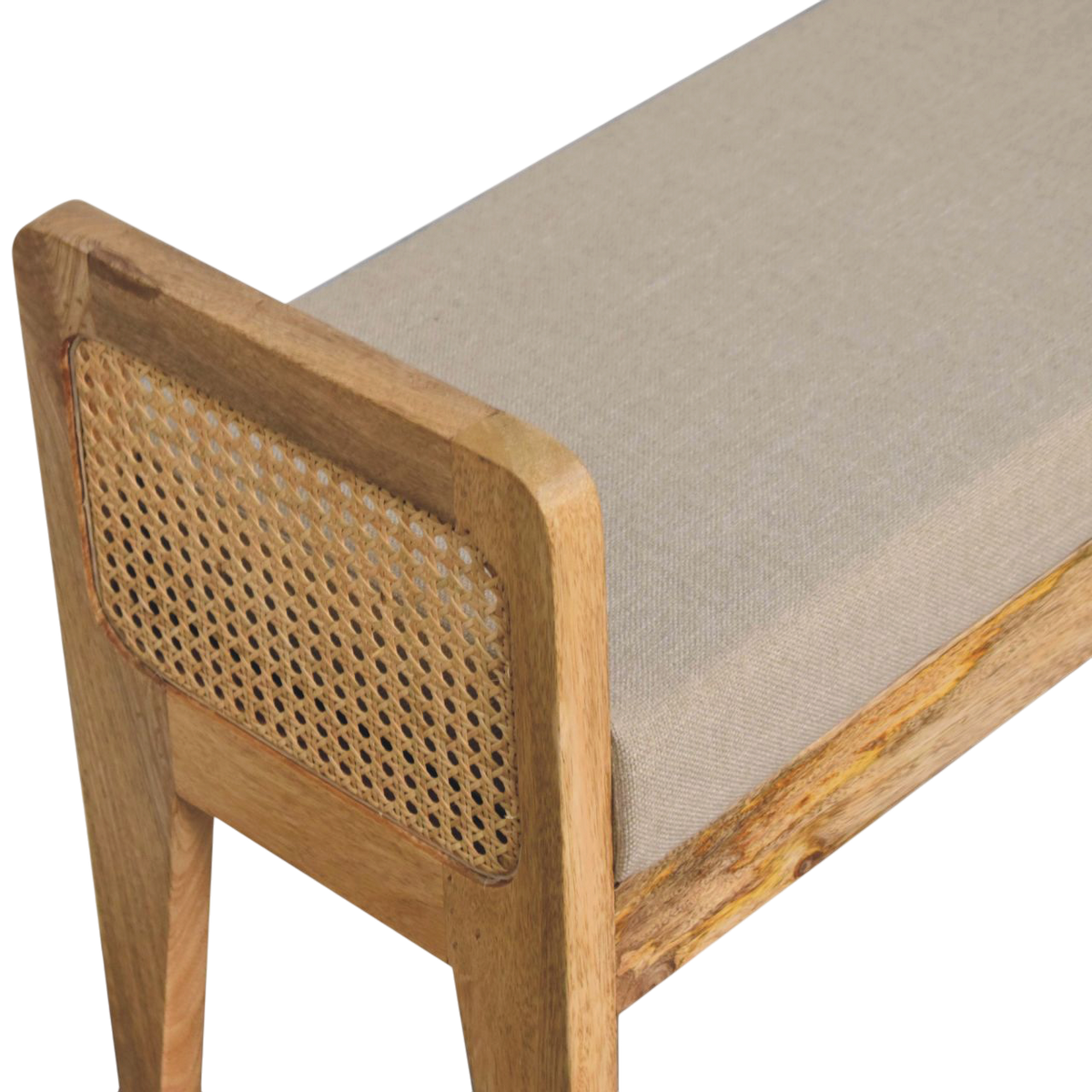Close view of the woven panels on the Comporta Rattan-Sided Bench in Clay Linen with Natural Rattan.